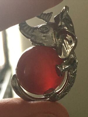 Elephant holding Carnelian Sphere  pendant