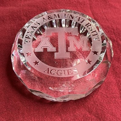 Texas A&M clear glass crystal round paperweight inscribed DDB 1960 on back 