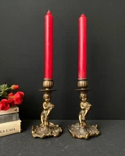 Antique bronze candlesticks with cherubini from Italy