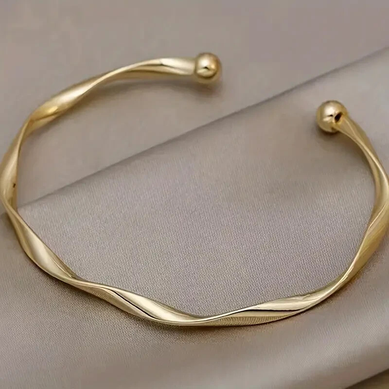 Elegant Gold-Tone Twisted Cuff Bangle with Spherical Ends-image