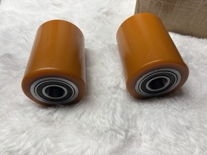 A Pair of Brand New Pallet Jack Poly Load Wheels With Bearings 3.25"D x 4.50"W