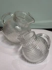 Vtg. Pair Anchor Hocking Manhattan Ribbed Tilted Ball Pitchers