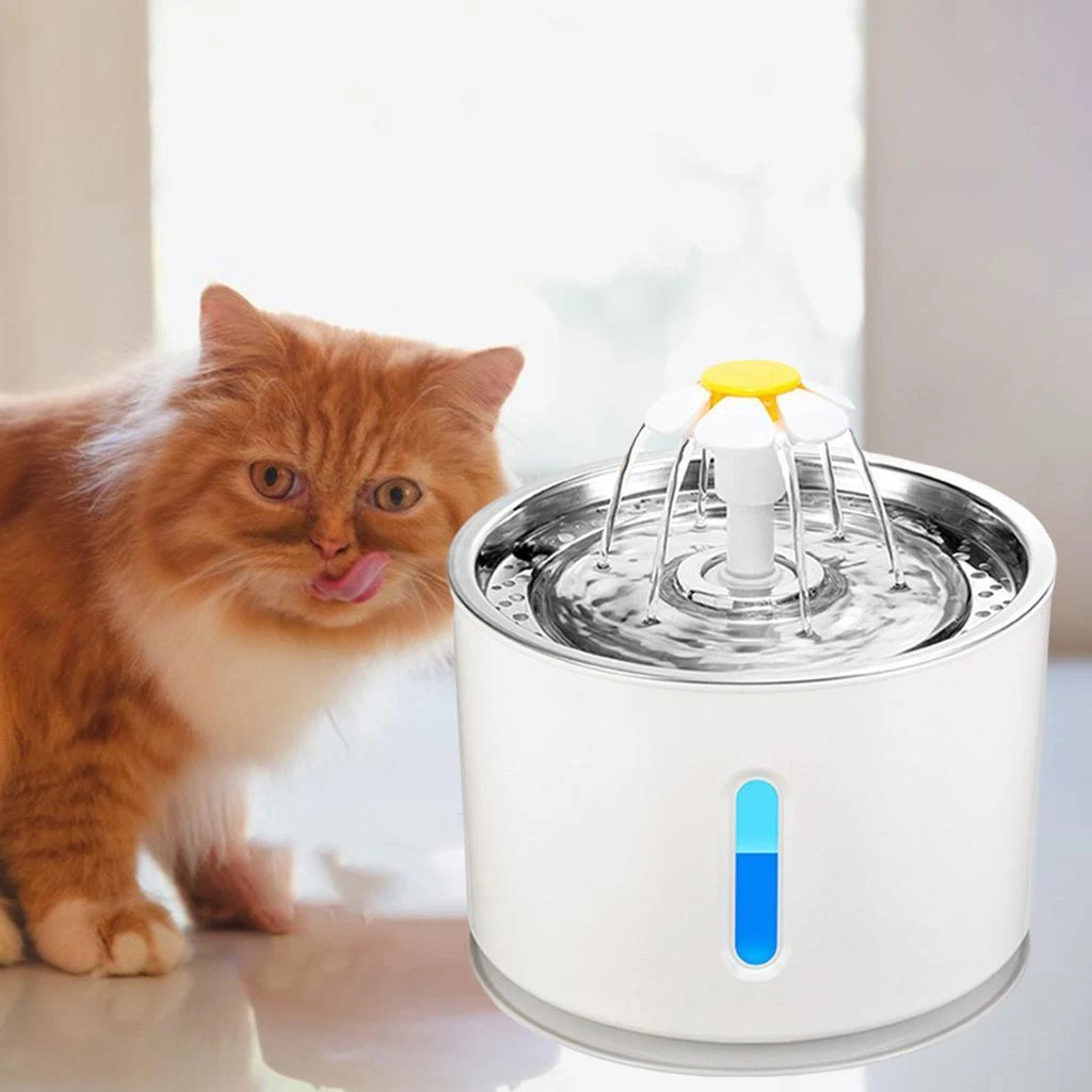 Cat flowing water fountain top