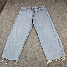 Vintage Levis 550 Relaxed Fit Jeans Made in USA Light Wash Raw Hem Cutoff