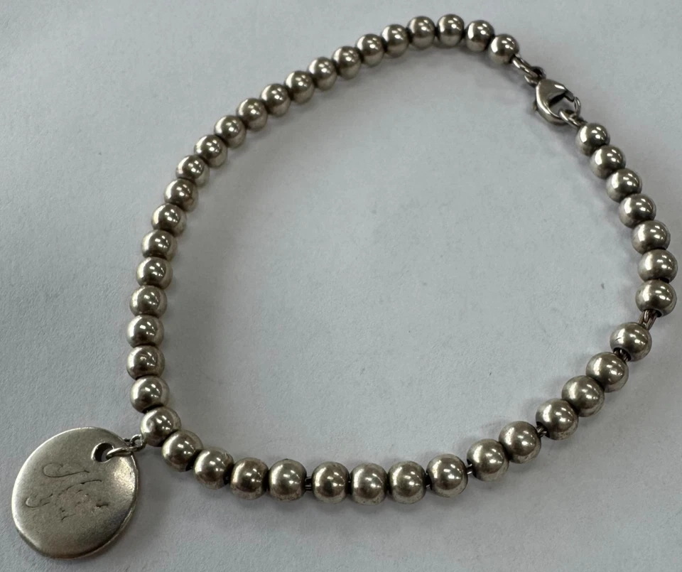 Pulsera Tiffany & Co Plata de Ley 4mm Cuentas "Te Amo" Etiqueta Redonda [105GCS] Foto 2 de 4