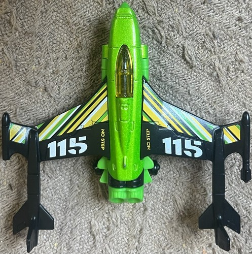 Mattel Matchbox Duel Tail Jet Flugzeug 2012 grün schwarz SB115 Y2948 - Bild 1 von 6