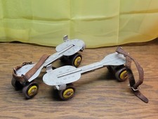 Vintage Union Hardware company metal roller skates leather strap adjustable