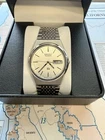Vintage 1984 Seiko 8123-7040 Quartz Men's Wristwatch - Stainless Steel, Day/Date