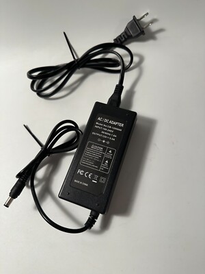 AC/DC Adapter Model No: CB-1205000 Input: 100-240V 50/60Hz 1.6A Output ...