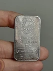 ENGELHARD GLOBE E MC  1  TROY OUNCE .999 FINE SILVER BAR