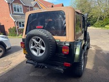 Green Jeep Wrangler TJ for sale 1998 (S Reg) with Bestop soft top.
