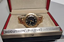 BULOVA ACCUTRON ASTRONAUT BLACK DIAL 1965, 14K GOLD BEZEL