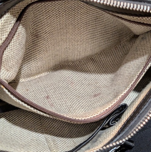 Borsa a tracolla Dooney & Bourke 1975 Hobo in pelle nera con ciottoli - Foto 16 di 19
