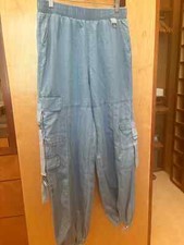 Ladies, casual cool cargo pant; Elastic waistband; Pockets everywhere;