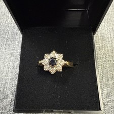18 Karat Yellow Gold With Black And Clear Diamonds Size O
