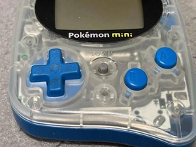 Nintendo Pokemon Mini console, soft cover, and 3 software sets