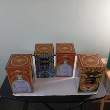 Set Of 4 Silver Patron Limited  Edition Tequila Tins (4 5/8" W X 8" T)