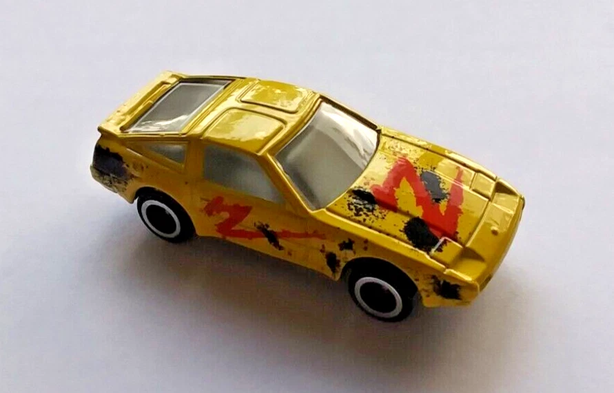 Tiras de metal fundido a presión ERTL Nissan 300ZX Z31 1/64 velocidades, nunca jugadas. Foto 3 de 4