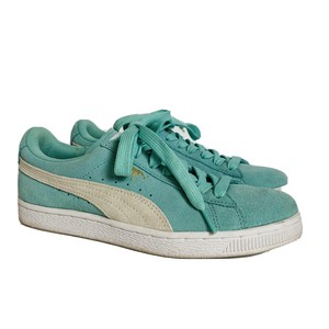 mint green puma sneakers