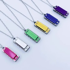 4 Hole 8 Tone Mini Harmonica Necklace Pendant Toy Musical Instrument Portable Ke