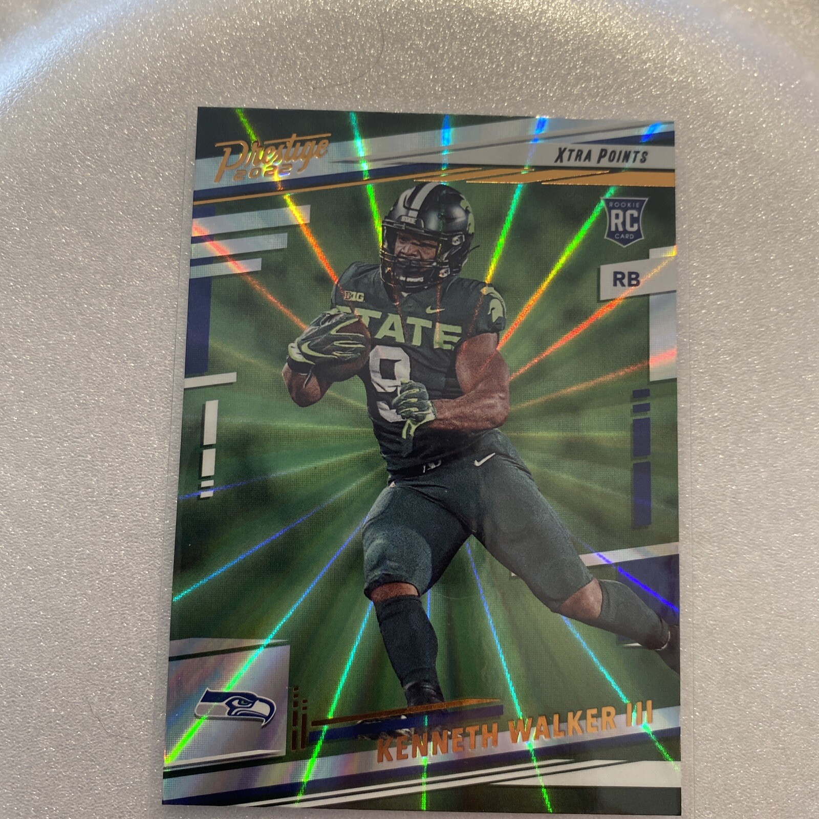 2022 Panini Prestige Xtra Points Kenneth Walker III Sunburst Parallel #314