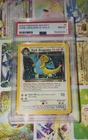 Pokemon 2000 Team Rocket Dark Dragonite 5/82 Holo Swirl PSA 8