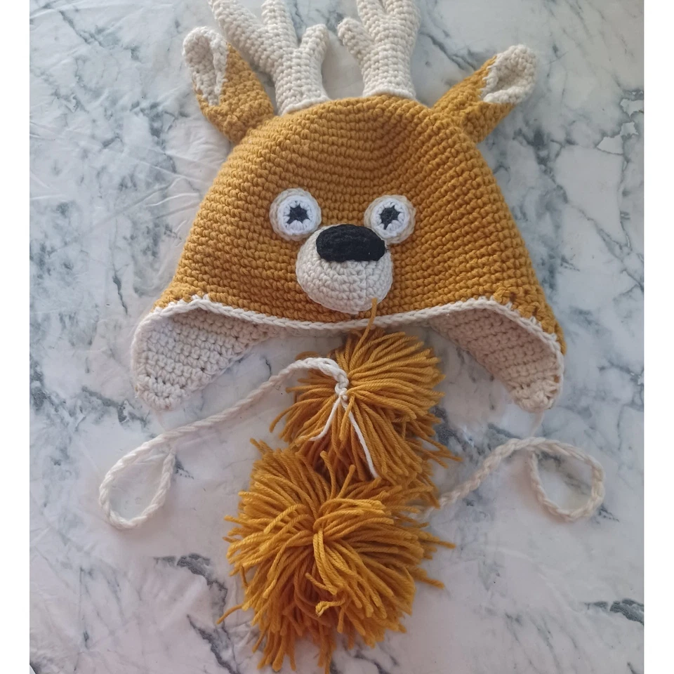 Sombrero de reno de ganchillo hecho a mano con astas y pompones gorro para niños pequeños Foto 2 de 3