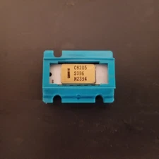 Intel C8205 white ceramic gold.  Early no date code in plastic carrier NOS RARE.