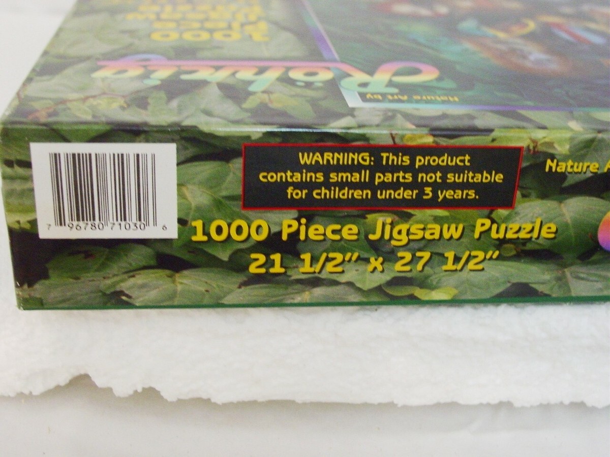 SunsOut Rohrig Puzzle Natures Art Collage African Animals