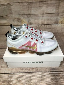 gold and white vapormax