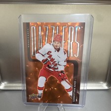 2025-26 Upper Deck Series 1 Dazzlers Orange Sebastian Aho #DZ-28 Hurricanes NHL