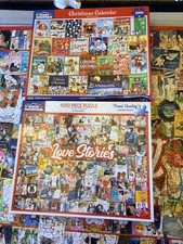 White Mountain lot of 2 - 1000 piece puzzles Christmas and Love Stories themes
