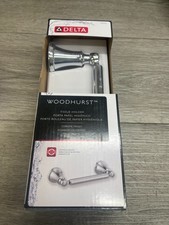 Delta 73250 Woodhurst Wall Mounted Pivoting Toilet Paper Holder