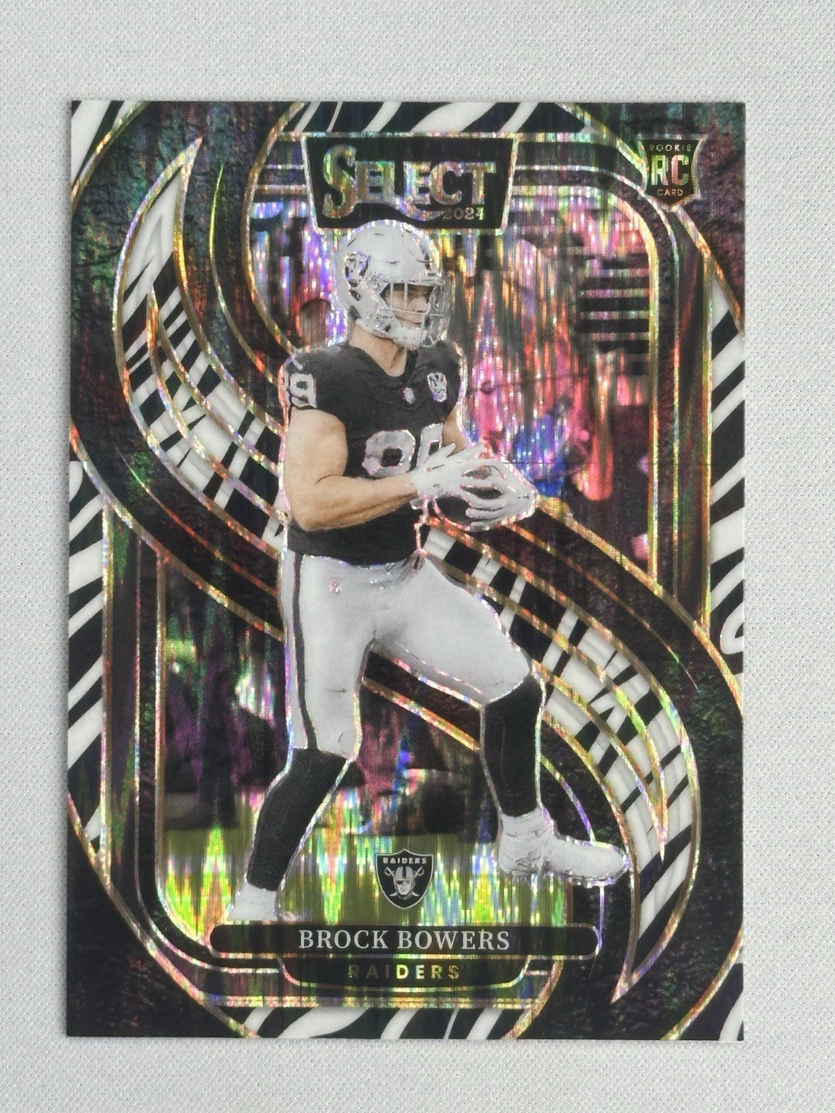 2024 Panini Select - Premier Level Brock Bowers #118 Zebra Prizm (RC)