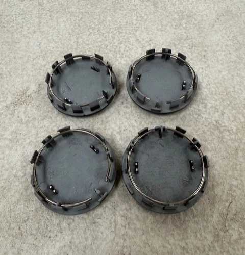 JUEGO DE 4 TAPAS CENTRALES DE RUEDA NEGRAS PARA NISSAN ROGUE SENTRA PATHFINDER OEM 40342-JF50A Foto 2 de 2