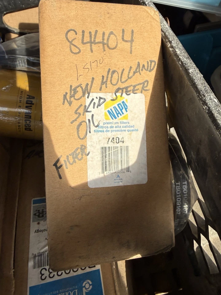 Filtro hidráulico NAPA Gold 7404 para minicargadora industrial New Holland Foto 2 de 2