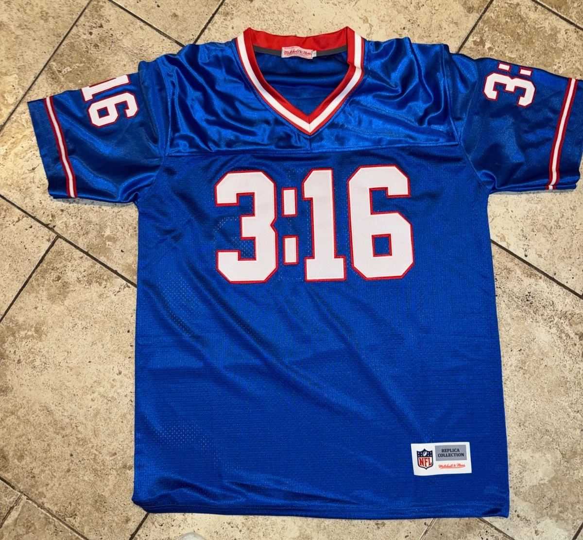 Preços baixos em Mitchell & Ness New York Giants Roupas e