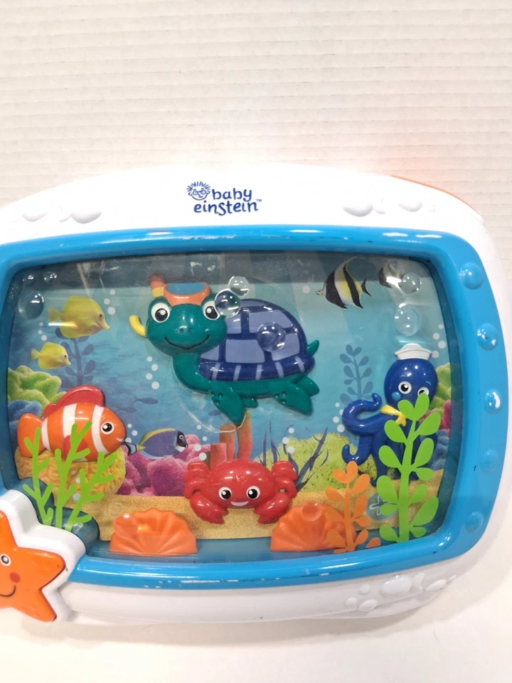 Chupete musical Baby Einstein Sea Dreams cuna juguete iluminar pecera sonido océano Foto 2 de 4