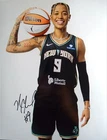 Natasha Cloud Autographed 8.5 X 11 photo.