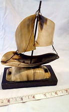 Old vintage musical cow horn boat on stand 1950's? Carved underside of hull