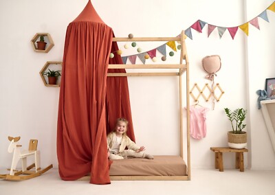 Rustic red muslin baby crib canopy