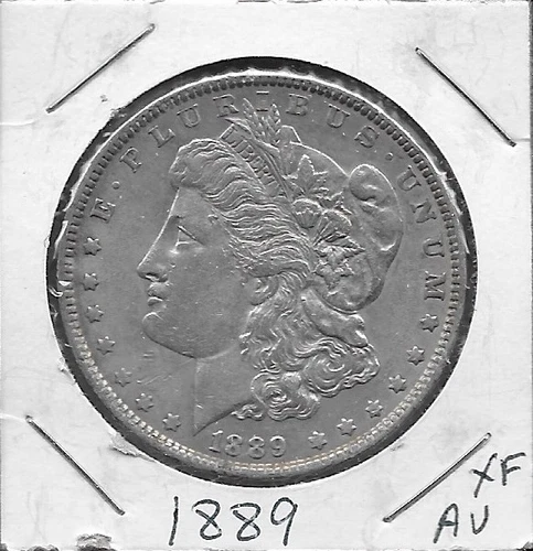 USA MORGAN SILVER DOLLAR 1889 XF-AU LAUREAT HEAD LEFT,DATE BELOW FLANKED BY ST