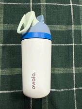 owala water bottle 14 oz white with blue trim , flip top straw for easy drinking