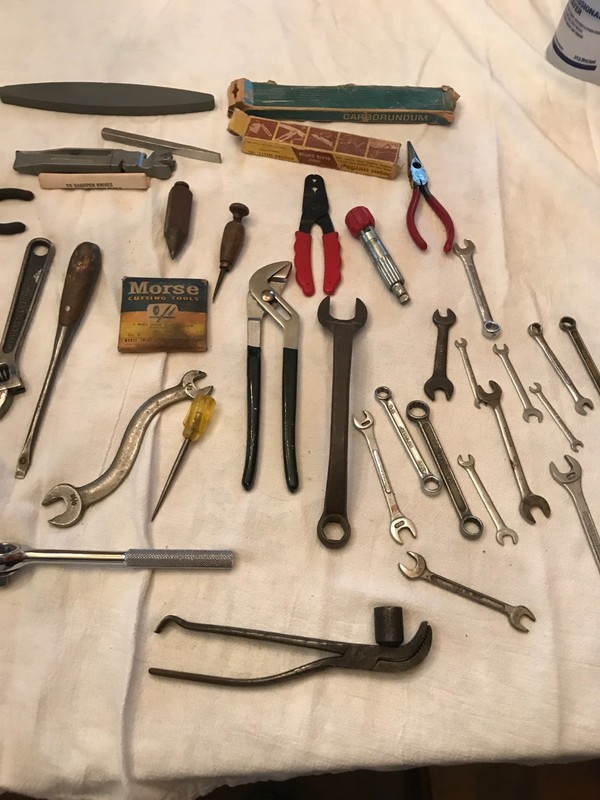 LOT OF ASSORTED TOOLS WRENCHES,PLYERS,WIRE STRIPPERS,SHARPENING STONE