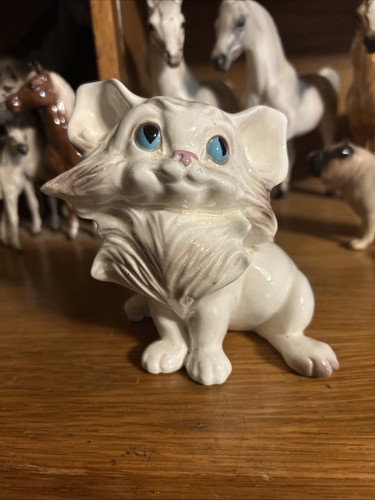 Freeman McFarland Comical White Kitten Cat