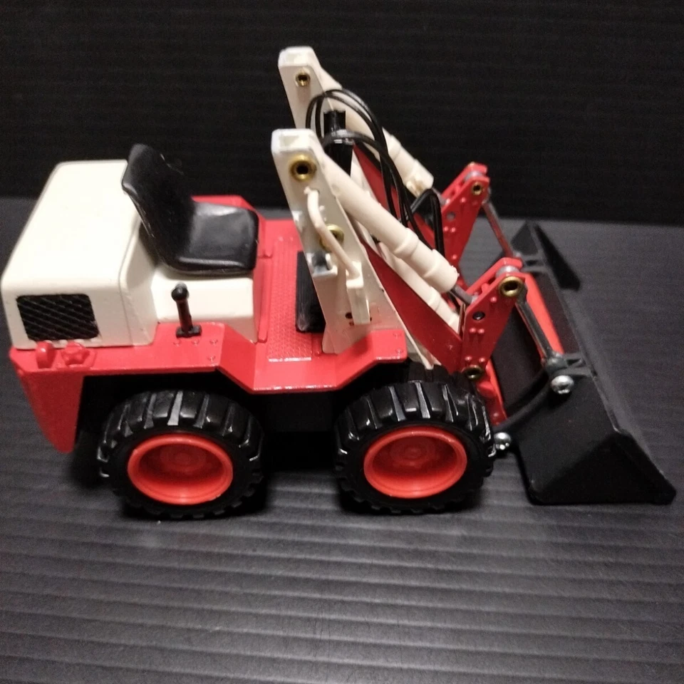 Mini cargador Yonezawa Komatsu SK07 1/25 modelo fundido a presión Japón años 80 raro usado Foto 3 de 4