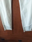 NWT Joseph Ribkoff Ivory Jeans w/ Silver Embellished Sides and Hems size 12 — photo 2