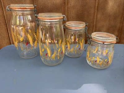 Vintage ARC glass Set Of 4  canisters. Golden Wheat Lid is stamped: arc/France