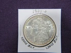 1904-O Morgan dollar in choice B.U. + condition