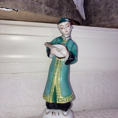 Vintage Asian porcelain musician with gold edging ￼7.5 X 3 